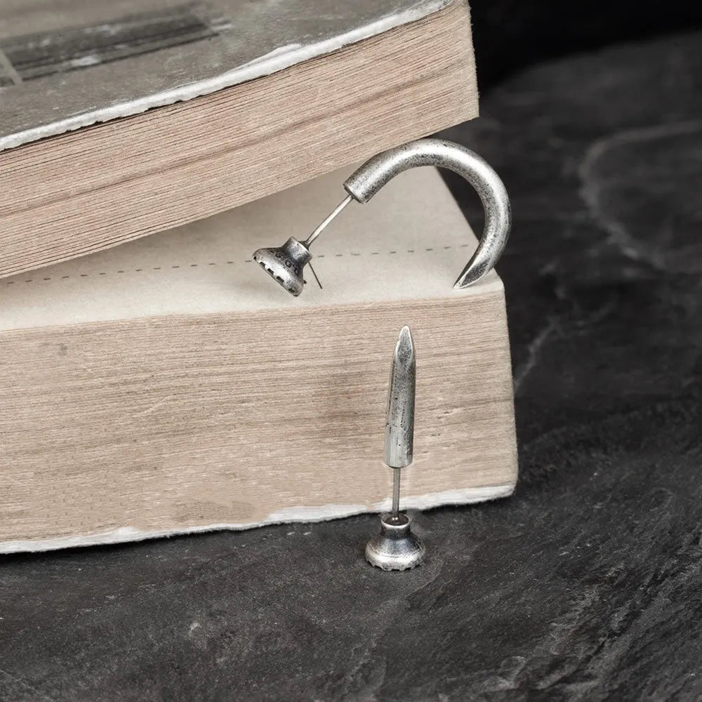 S925 sterling silver nail stud earring available in straight and curved retro punk styles for unisex wear