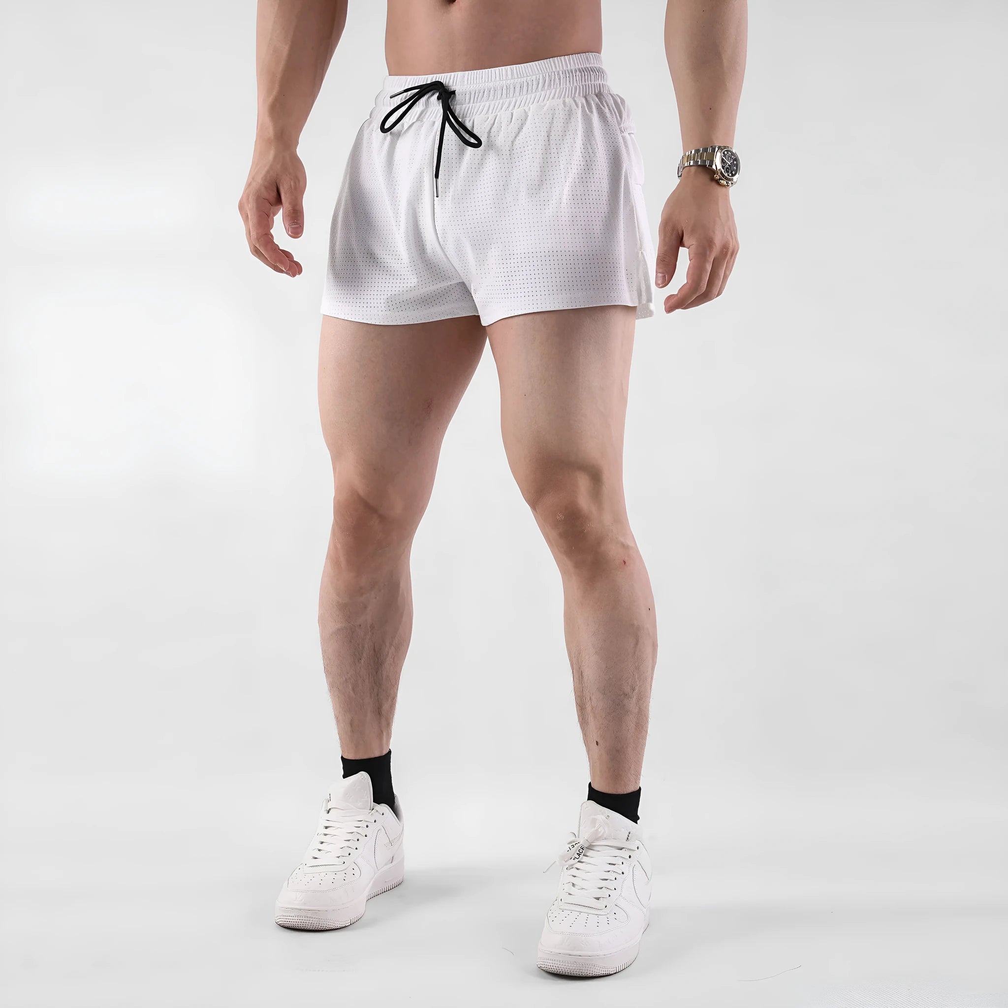 Men's black and white quick-dry nylon summer shorts on a size chart showing options from M to XXXL