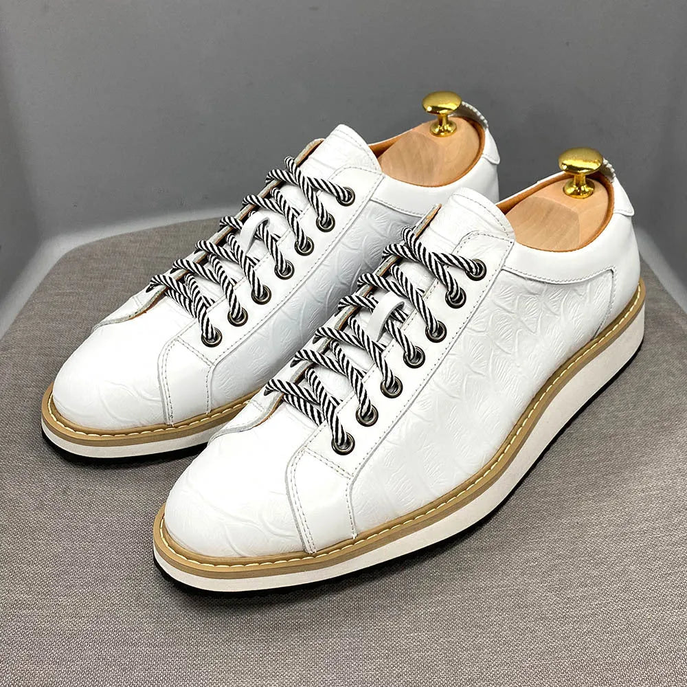 Men's handmade low-tube shoes with embossed pattern design and front tie closure in multiple colours