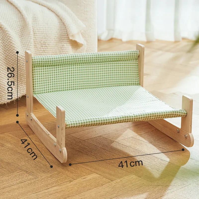 Elevated wood frame cat hammock bed with soft cloth covering in beach chair style design