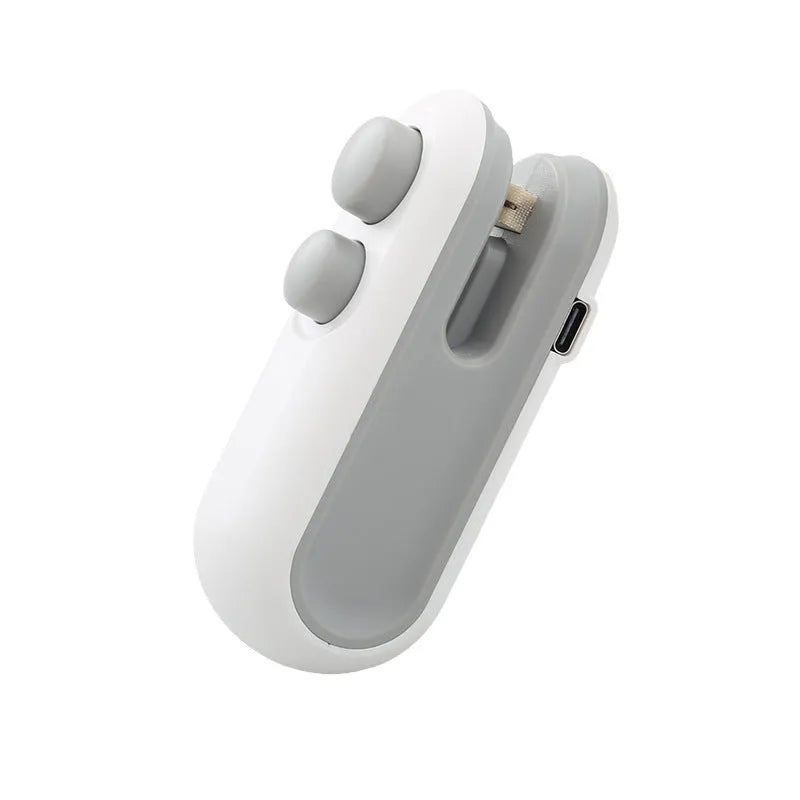 White handheld USB rechargeable heat sealing machine for chip bags with magnetic back and cutter