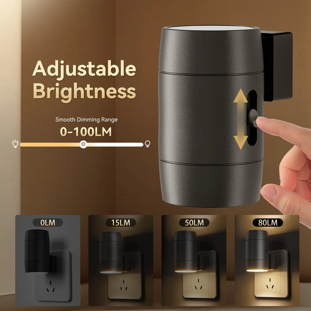 Small white plug-in night light with adjustable dial and rotatable head shown in a UK power socket.