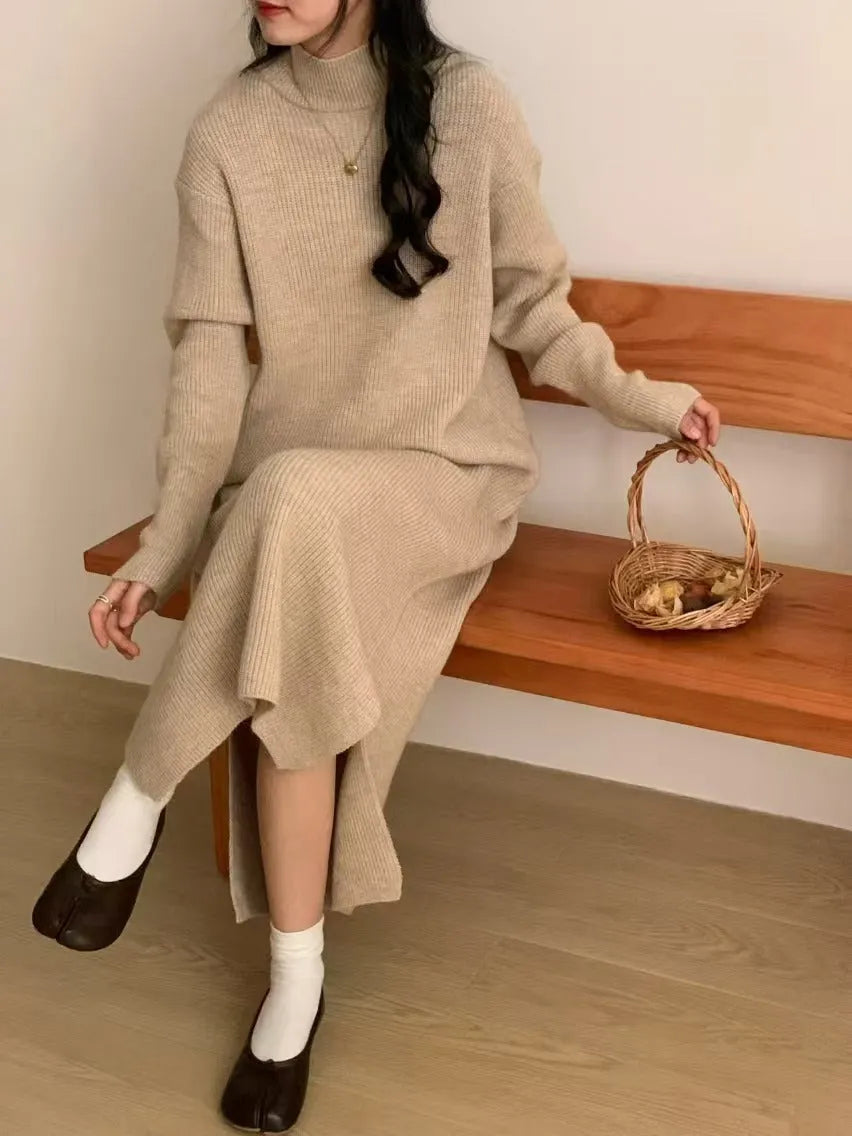 Acrylic half turtleneck knitted dress in graphite colour with high waist and overknee long length