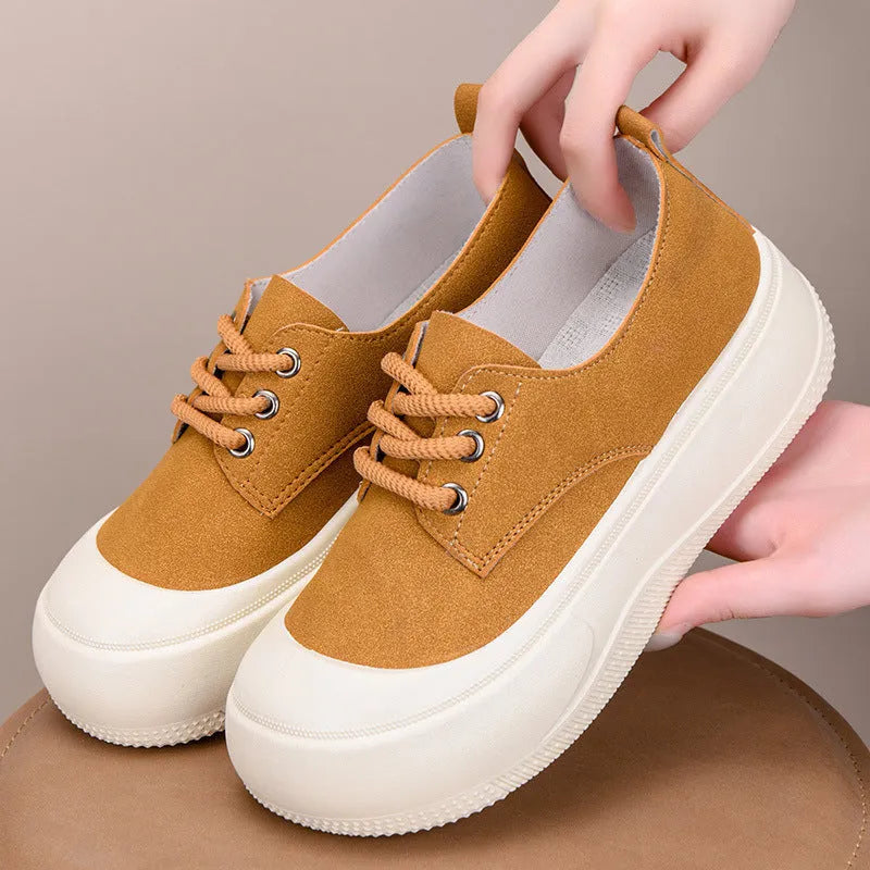 Women's camel suede platform loafers with round toe, flat heel, and front lace-up.