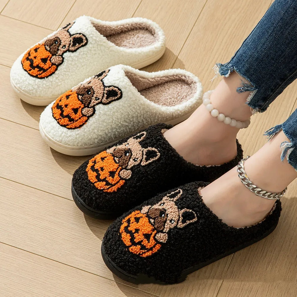 Black and white Halloween pumpkin patterned plush slippers with round toe and TPR rubber soles