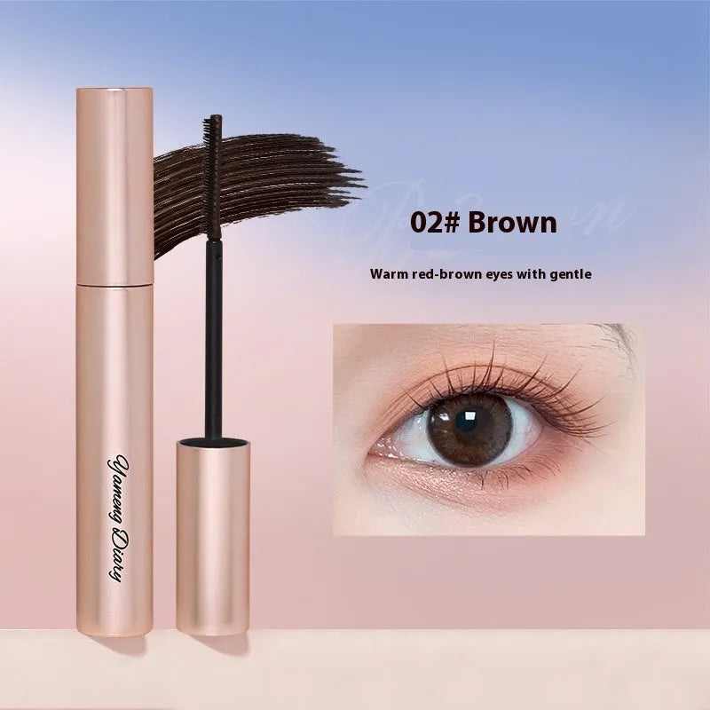 Long-lasting curling mascara tube in black and brown colour options with applicator wand