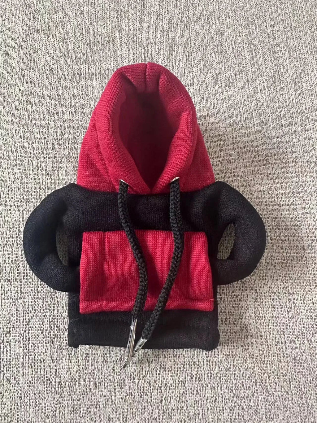 Polyester car gear lever hooded cover in red and white colour combination showing 12x13cm dimensions