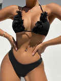 Black women's swimwear two-piece set with gathered top and matching shorts