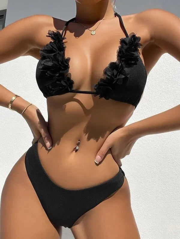 Black women's swimwear two-piece set with gathered top and matching shorts