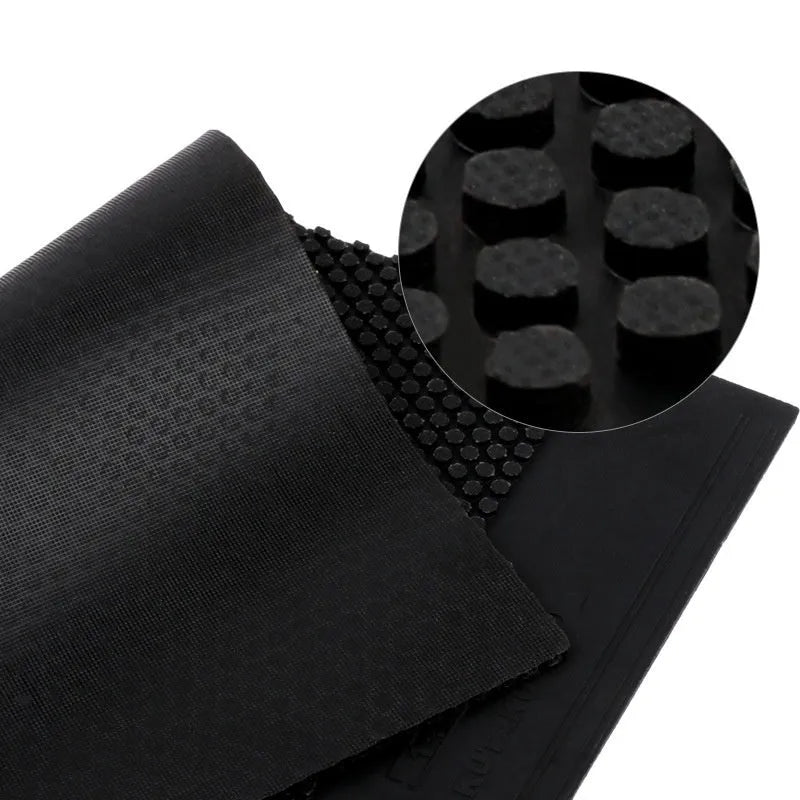 A single sheet of raw table tennis rubber in black or red colour with a small-particle texture surface.