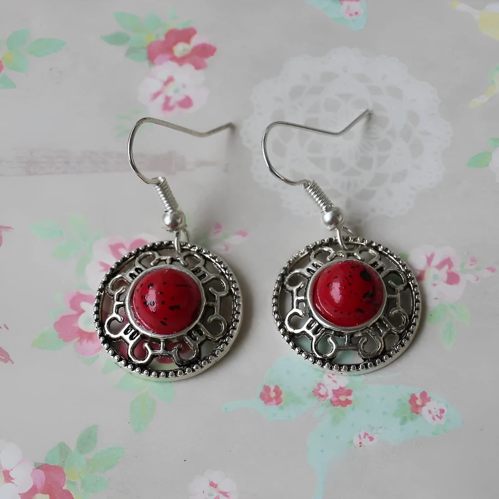 Handmade Miao silver ethnic earrings with geometric turquoise flower disk design