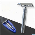 Chrome double-edged safety razor with metal handle, one blade, and a storage box.