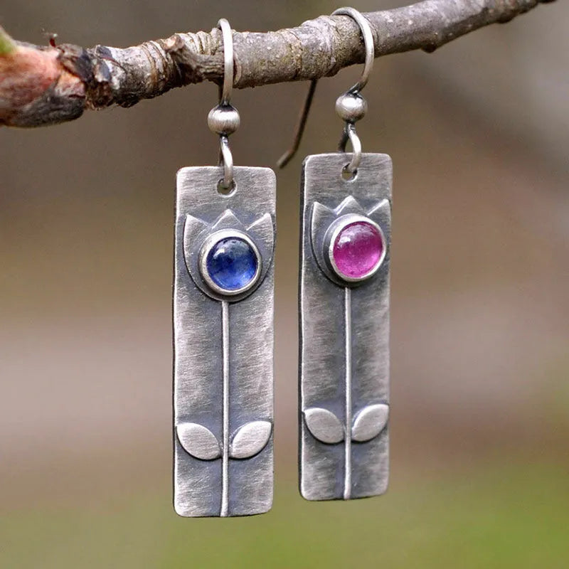 Antique finish red sapphire earrings with geometric ellipse design in retro style