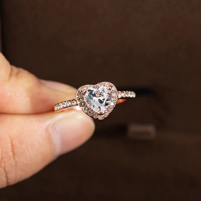Heart-shaped crystal fashion ring in rose gold or silvery finish on white copper