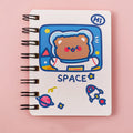 Astronaut series pocket flipper notebook showing compact 10.5x8cm size with space-themed cover design