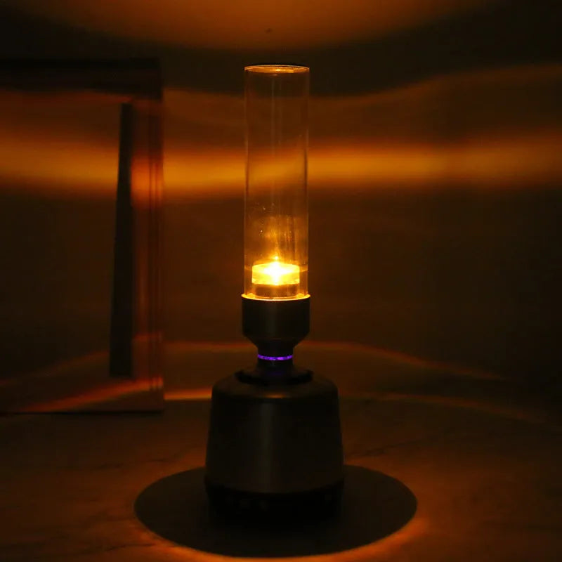 White silver Bluetooth speaker with candlelight-style night light function