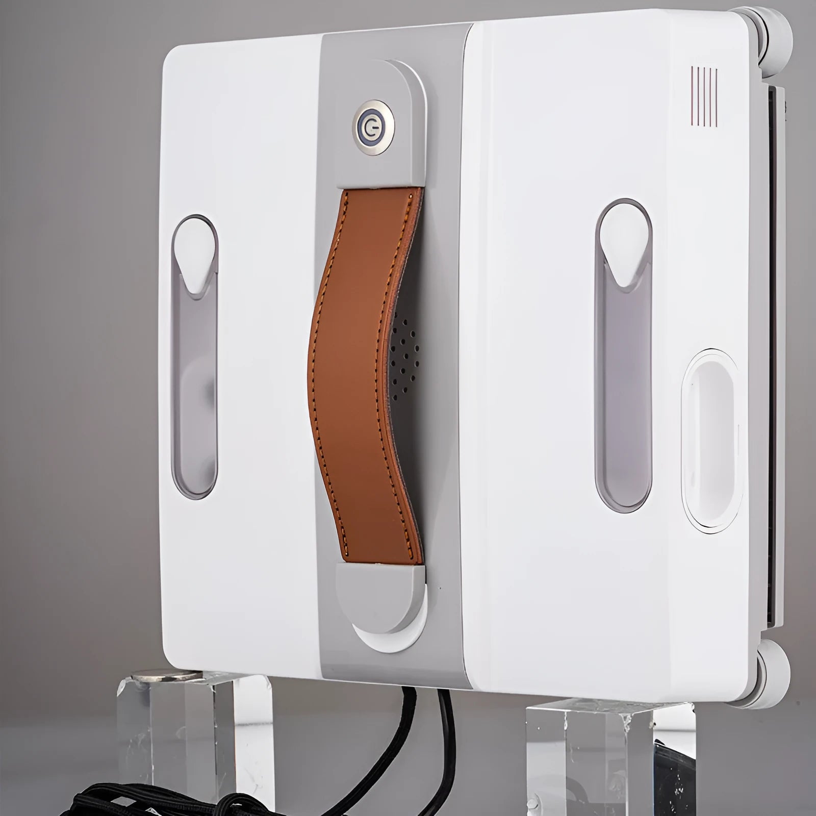 White electric window cleaning robot with four water spray jets for automated high-rise window washing