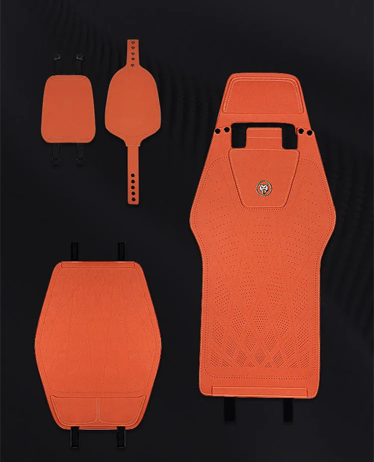 Genuine leather and fur car seat cover with patterned ventilation holes on a car seat.
