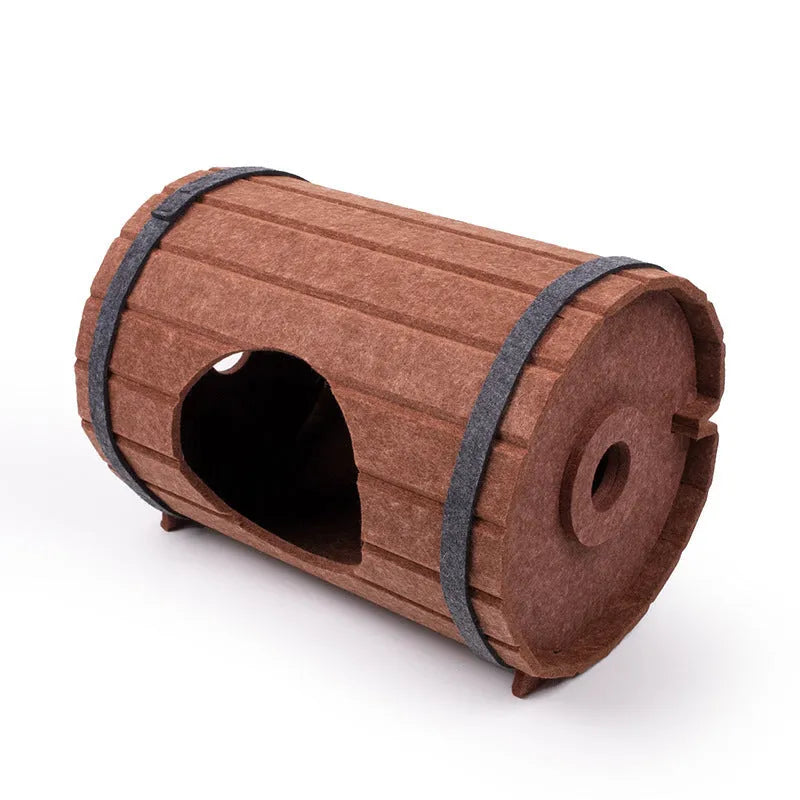Assembled wine barrel-shaped cat bed made from soft grey polyester fibre felt.