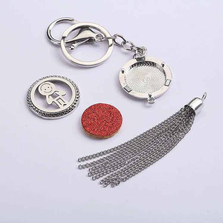 Silver alloy tassel car fragrance pendant hanging on a 50cm chain with colourful scented cotton pieces