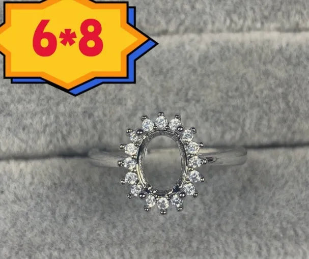 Oval denier ring with open mouth design and five-pointed star detail on electroplated copper