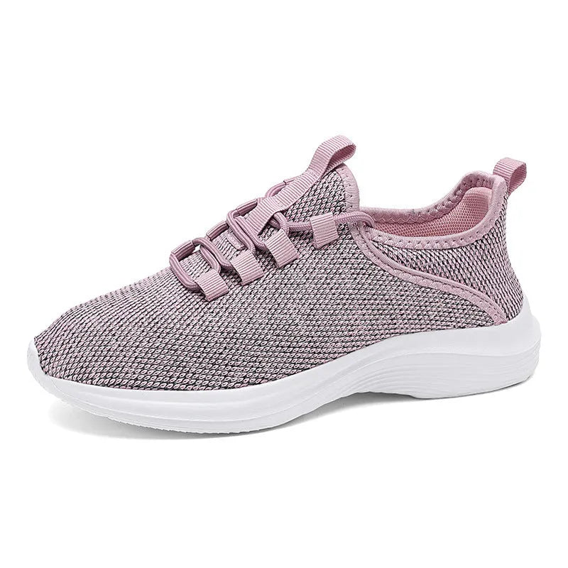 Women's low-top casual sneakers in black with breathable mesh upper and white EVA sole.