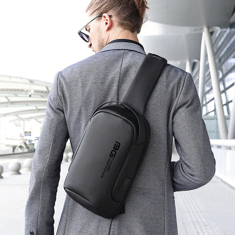 Men's black Oxford cloth shoulder bag with USB port for business travel.