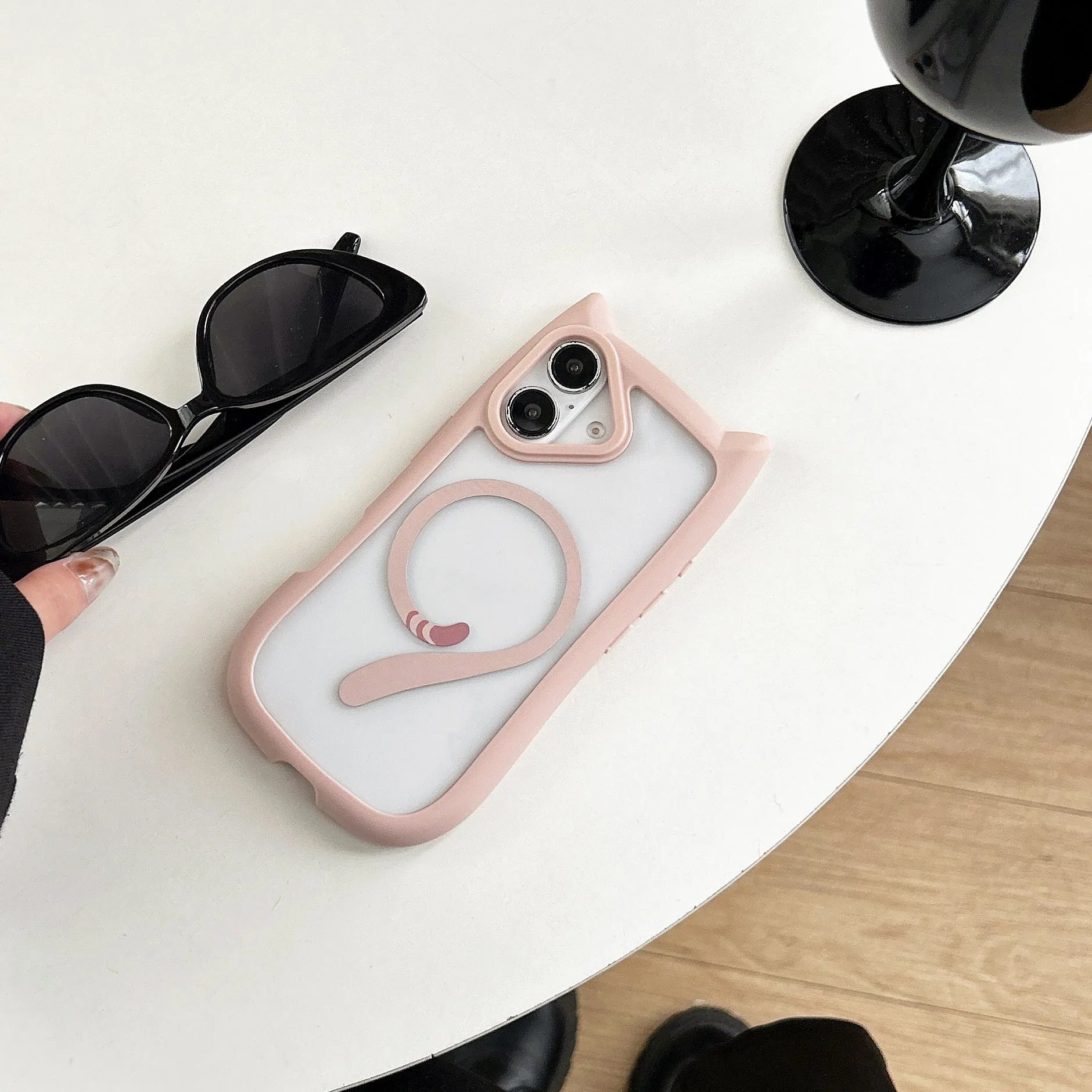 Transparent acrylic and TPU two-in-one phone case for iPhone 17 series in black, shown with magnetic function
