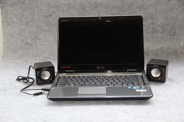 Small black square USB-powered 2.0 computer speaker for desktop placement