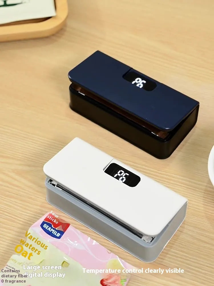 Small portable mini heat sealing machine for plastic bags in blue colour