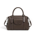 Genuine leather ladies shoulder bag in street trend style with lock detail and contrast stitching.