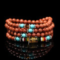 Women's multi-circle bracelet with 108 nugget sand beads, golden star stone accents, and retro fu character charms