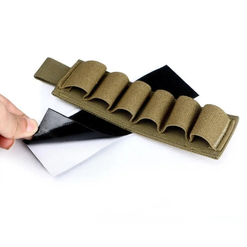 Tactical 6-hole storage sticker in 1000D nylon, shown in army colour, measuring 5 by 16.5 centimetres.