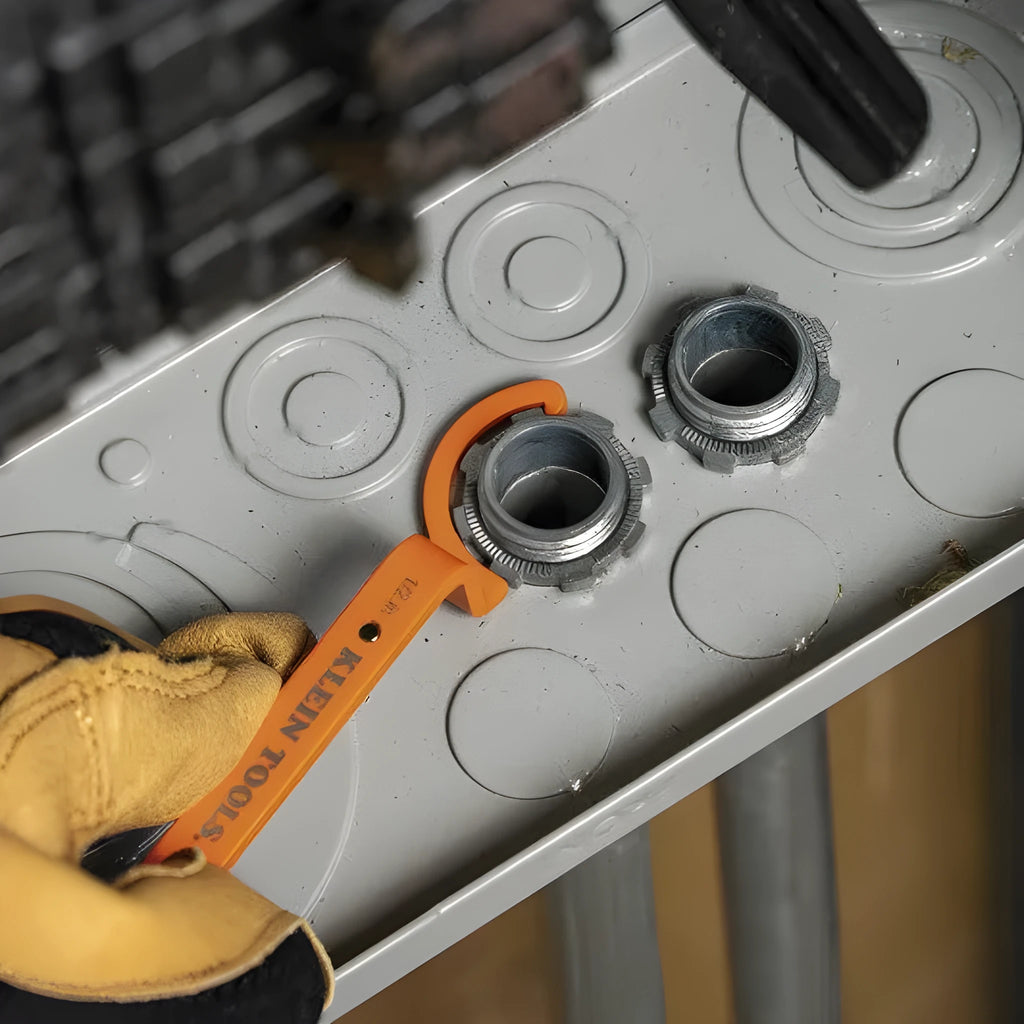 Orange, grey, and black crescent wrenches with magnetic suction lock in a three-piece tool kit.
