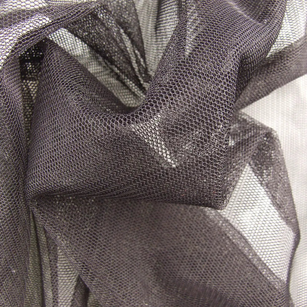 Lightweight mesh anti-mosquito suit set comprising a hooded jacket, trousers, and booties laid out flat.