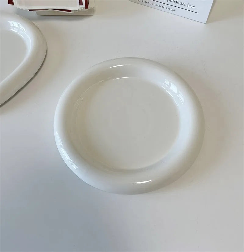 White ceramic plate with chubby toot bear illustration, porcelain potted tray.