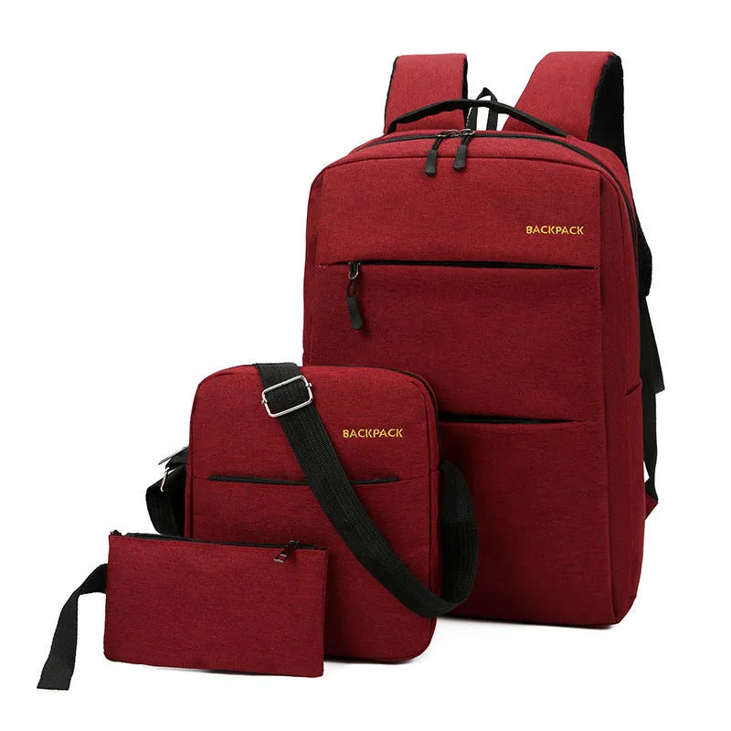 Set of three men's casual nylon laptop backpacks with USB charging port in black, grey, navy, and wine red colours.