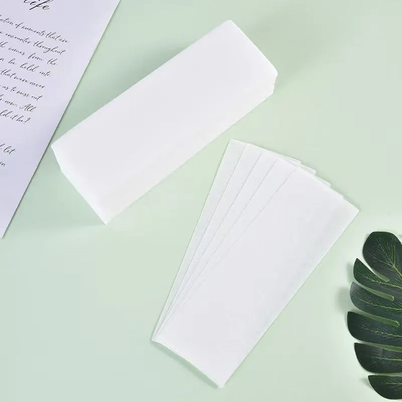 Non-woven fabric hair removal wax paper strips for waxing applications