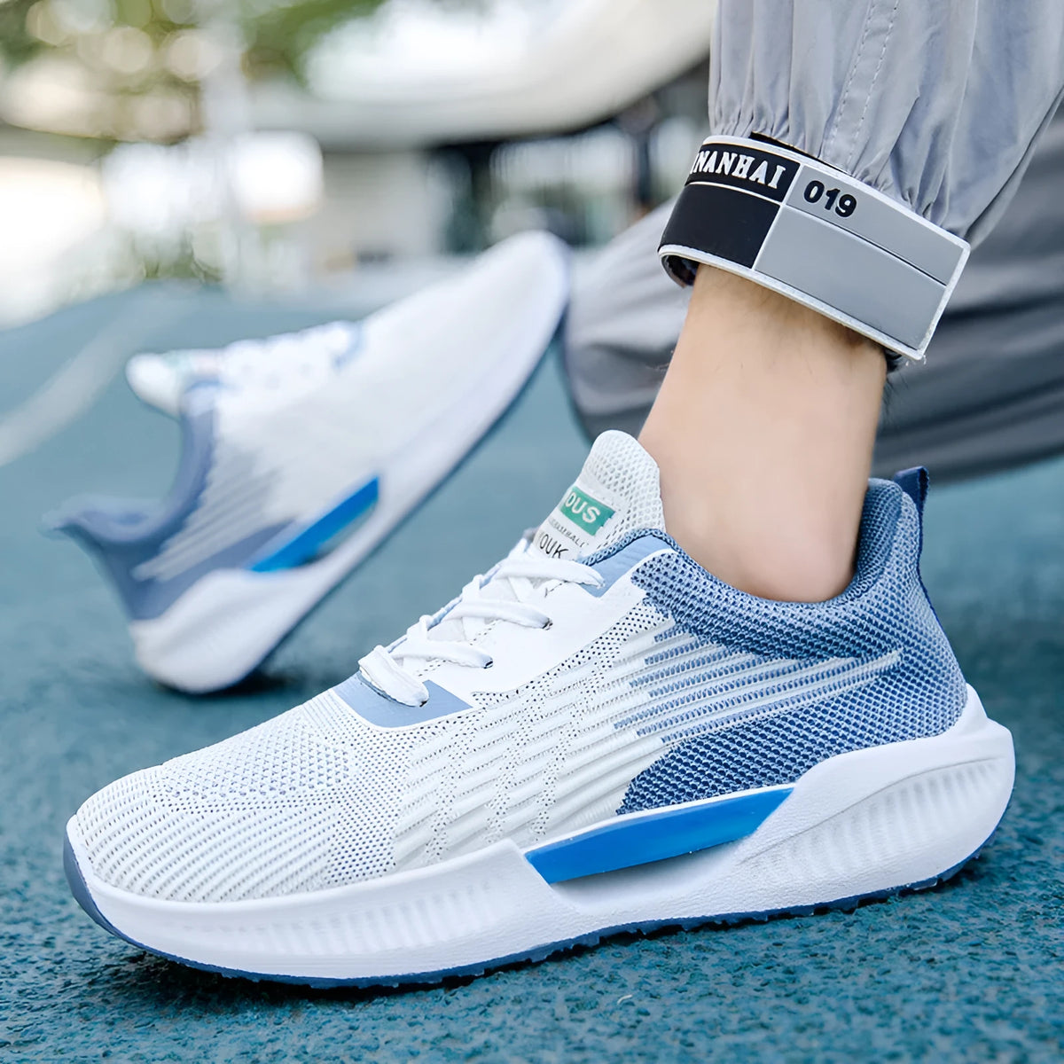 Men's blue casual sports shoes with fabric upper and round toe design