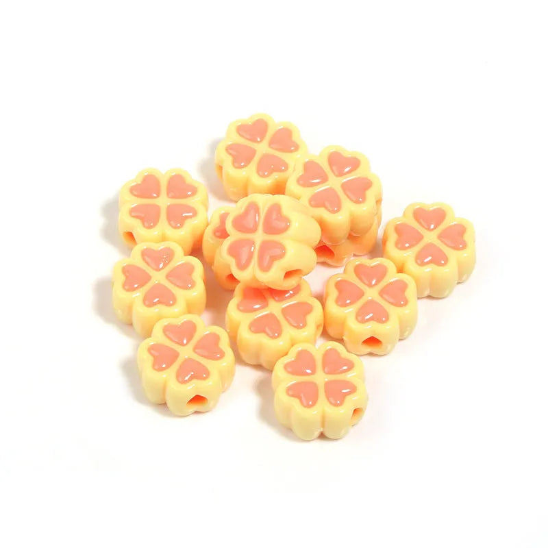 15mm acrylic clover beads with cartoon love pattern and frosted finish in mixed colours