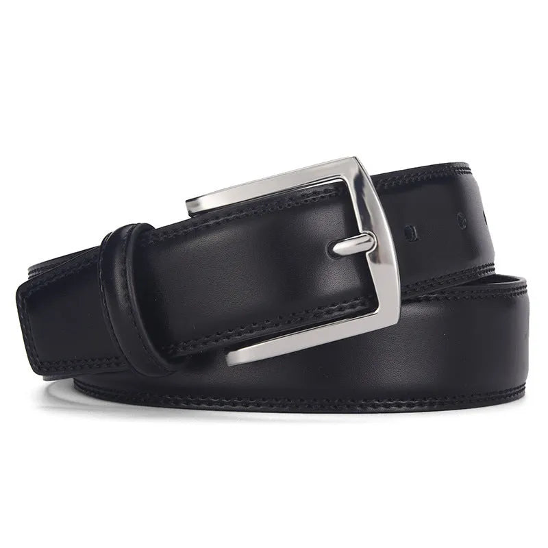 Men's black leather belt with a silver alloy pin buckle on a wooden background.
