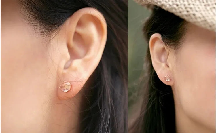 Rose gold plated copper stud earrings with synthetic ross quartz and crystal inlay in drop shape
