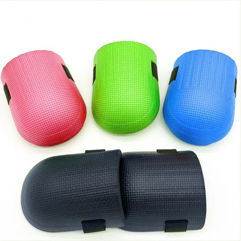 A pair of EVA foam kneepads, approximately 11mm thick, shown in one of four colour options: black, blue, green, or pink.
