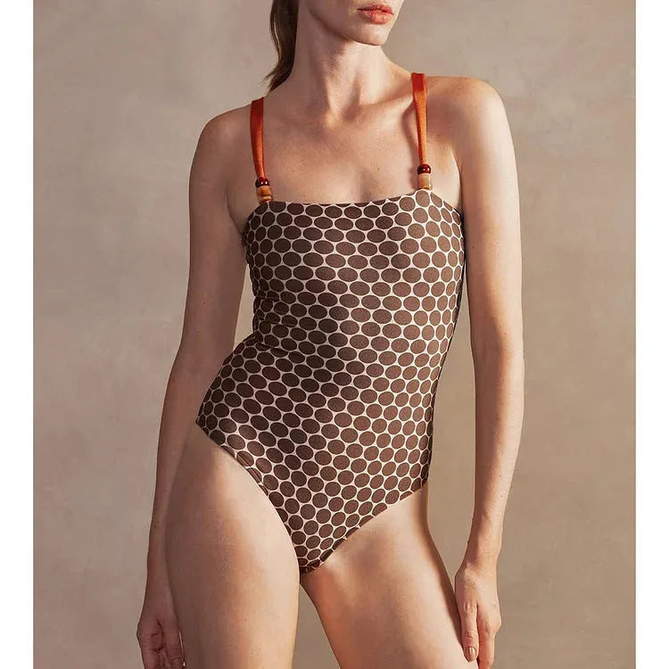 Printed dots pattern one-piece swimsuit with matching wrap skirt set for women
