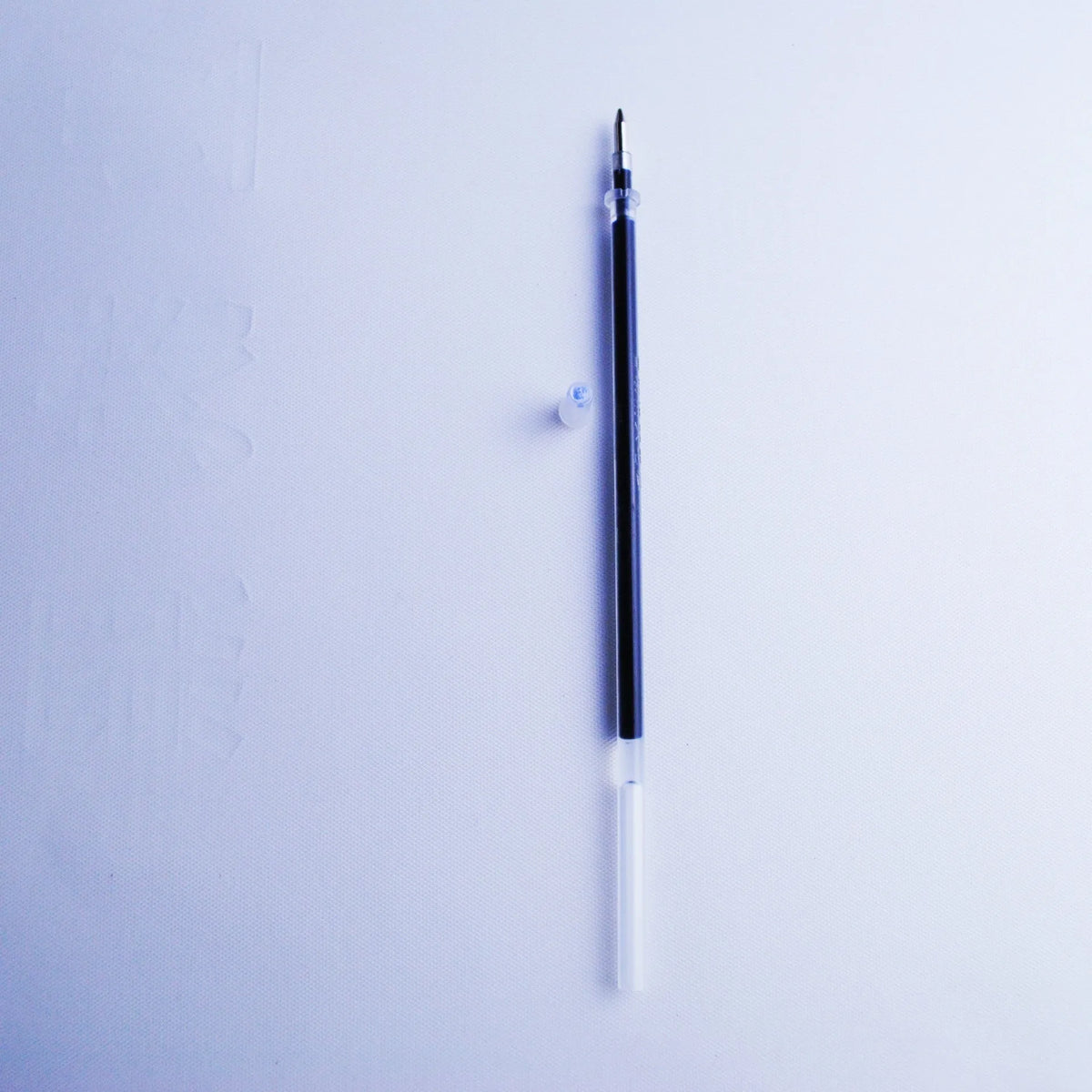 Automatic fading ink pen set with eight blue refills and 0.5mm tip