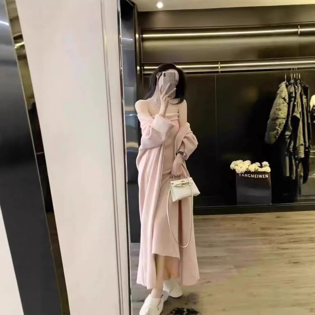 Women's grey knitted cardigan and dress sweater suit set showing both pieces laid flat.