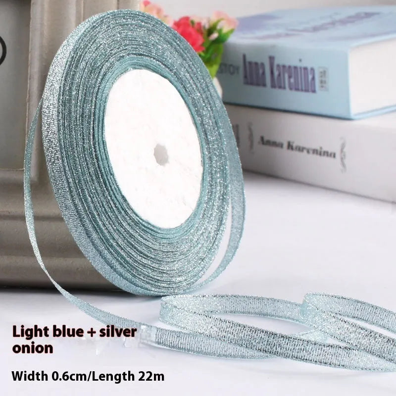 Roll of polyester gift packaging ribbon with 0.6cm width and 22 metre length in various colour options