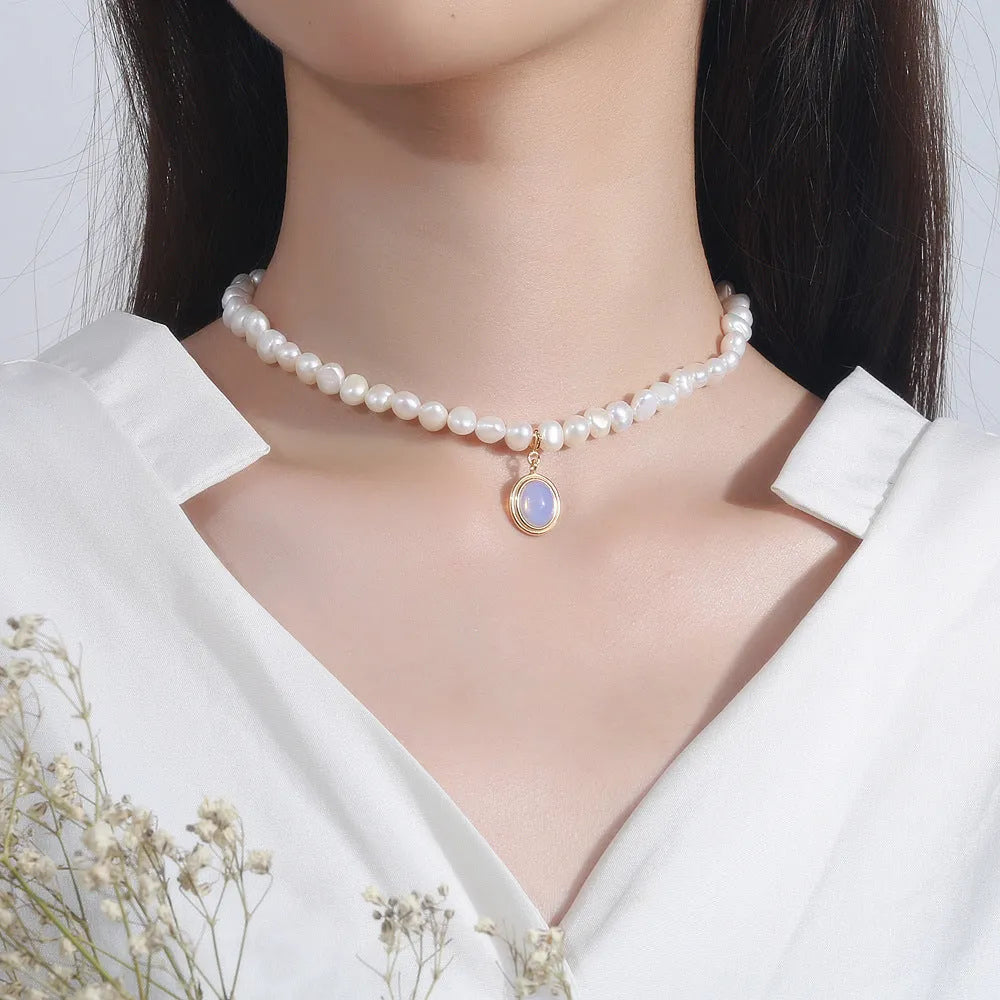Adjustable sterling silver pearl necklace with irregular geometry and extension chain