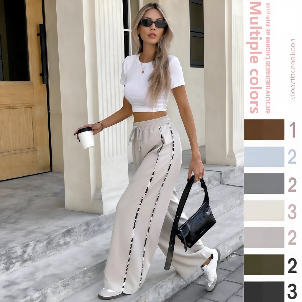 Women's high-waisted loose straight leg casual trousers with a front lace-up drawstring detail in army green.
