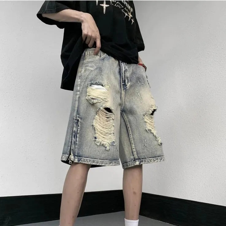 Blue retro tattered denim shorts with wide leg cut and loose fit for women